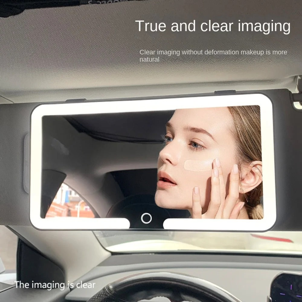 Touchscreen mirror with car light adjustment