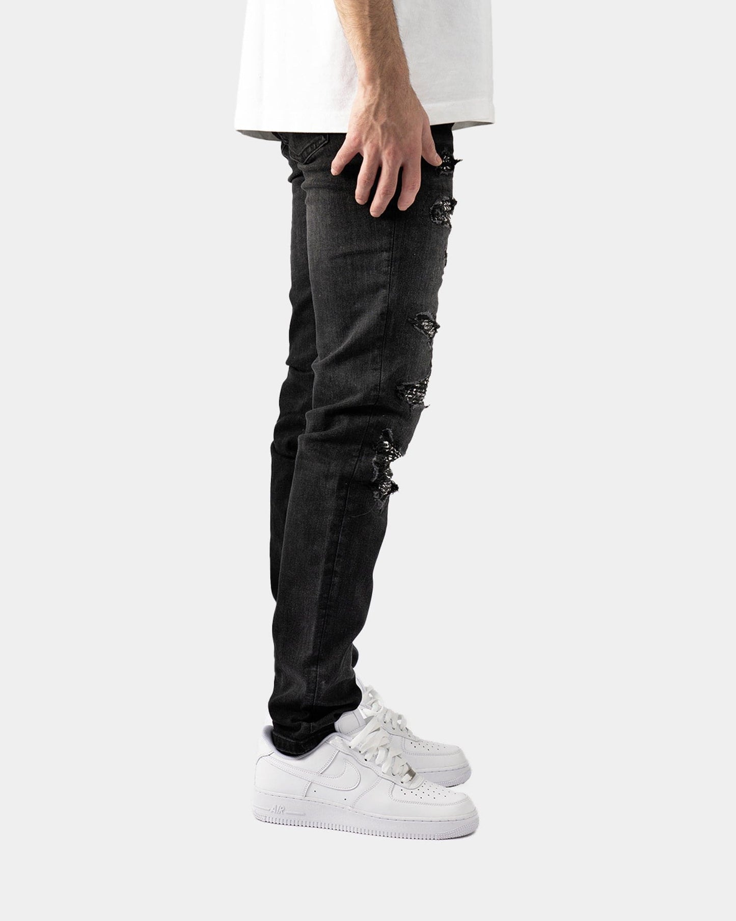 Jeans Neri Strappati™ | Stile Slim Fit con Dettagli Lucidi