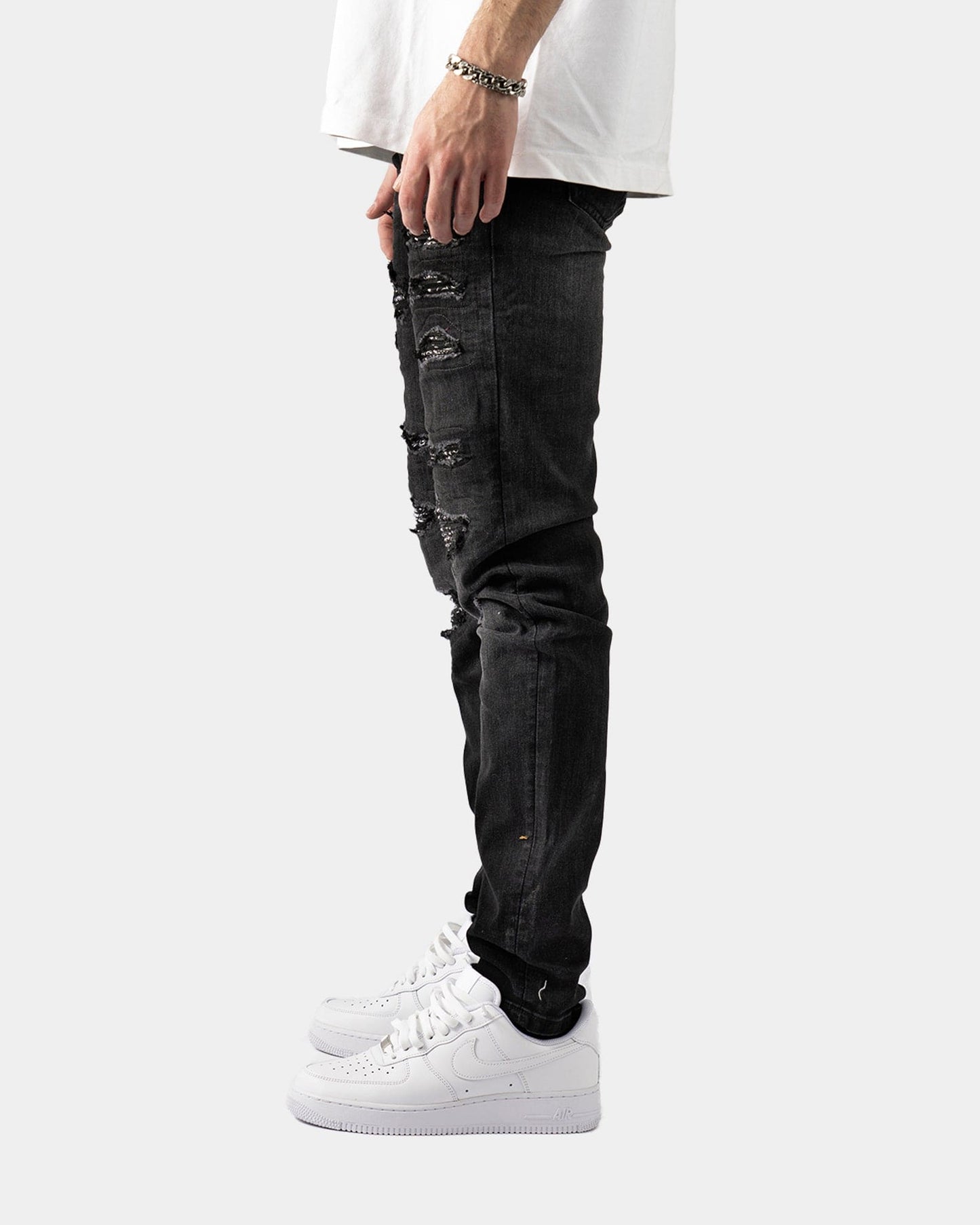 Jeans Neri Strappati™ | Stile Slim Fit con Dettagli Lucidi