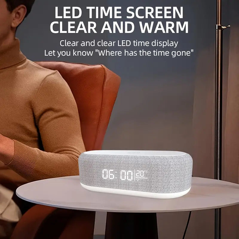 Wireless charging station with digital alarm clock and night light