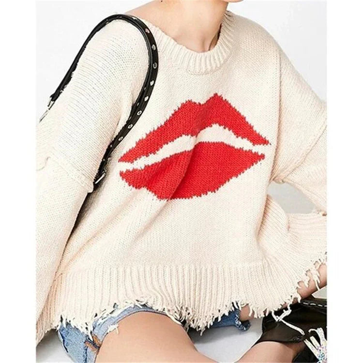 <tc>Women’s Oversized Sweater™ | Chunky Knit with Lips Print and Fringed Hem</tc>
