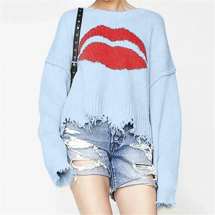 <tc>Women’s Oversized Sweater™ | Chunky Knit with Lips Print and Fringed Hem</tc>