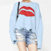 <tc>Women’s Oversized Sweater™ | Chunky Knit with Lips Print and Fringed Hem</tc>