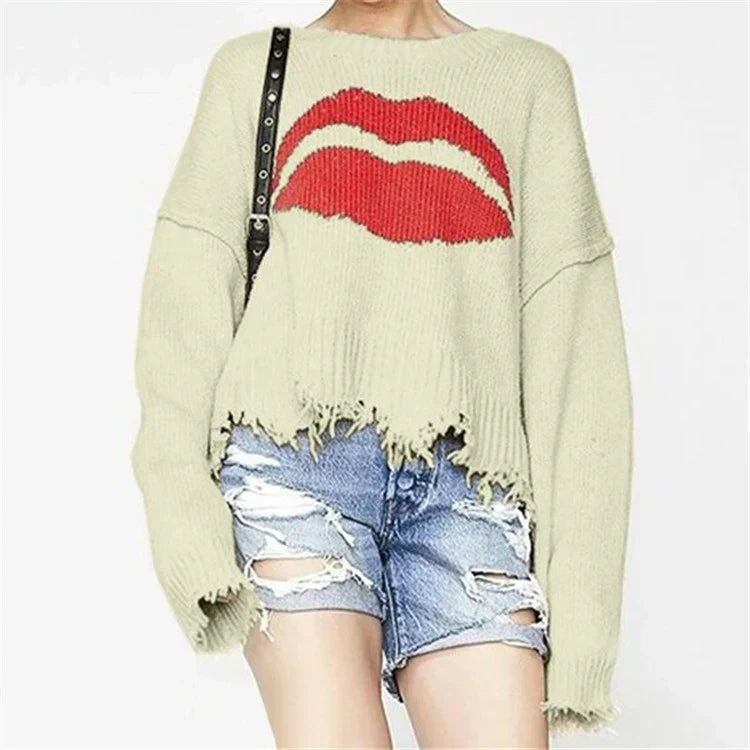 <tc>Women’s Oversized Sweater™ | Chunky Knit with Lips Print and Fringed Hem</tc>