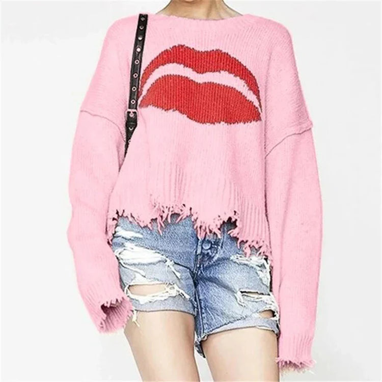 <tc>Women’s Oversized Sweater™ | Chunky Knit with Lips Print and Fringed Hem</tc>