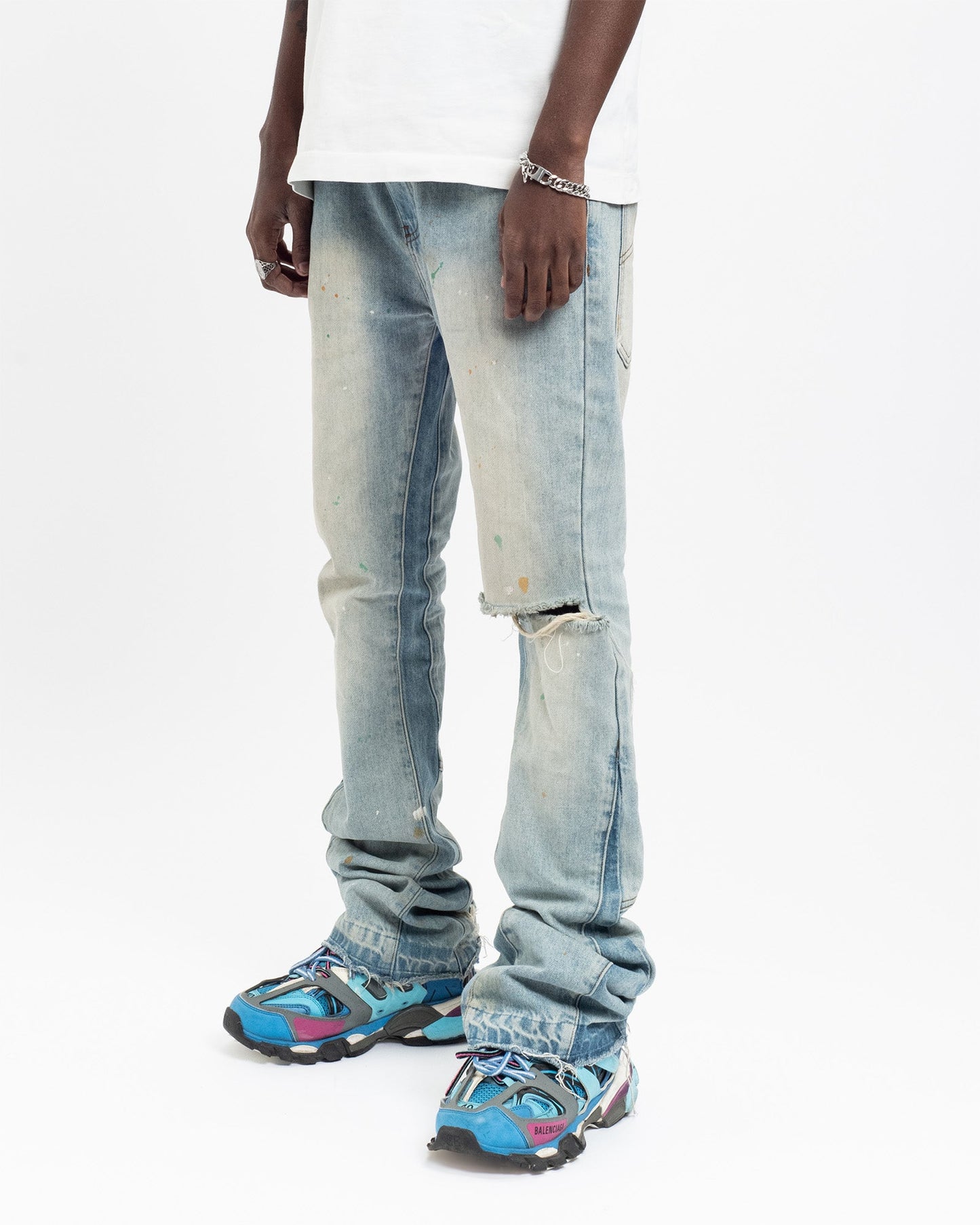 Flared Denim™ | Jeans Azzurro Svasato con Strappo al Ginocchio