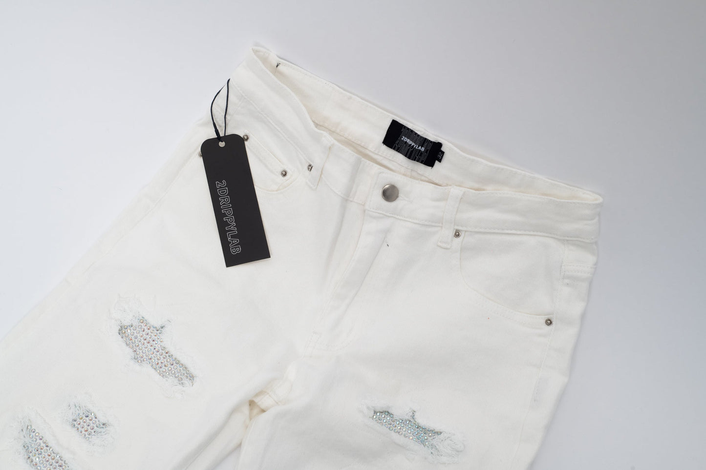 Jeans Bianchi Strappati™ | Stile Slim Fit con Dettagli Ricamati