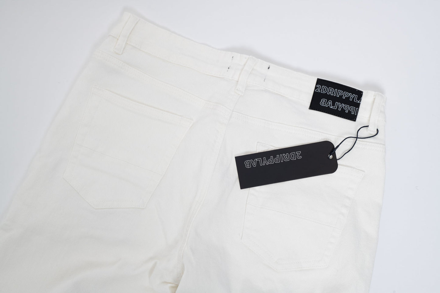 Jeans Bianchi Strappati™ | Stile Slim Fit con Dettagli Ricamati