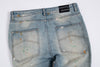 Flared Denim | Jeans Azzurro Svasato con Strappo al Ginocchio