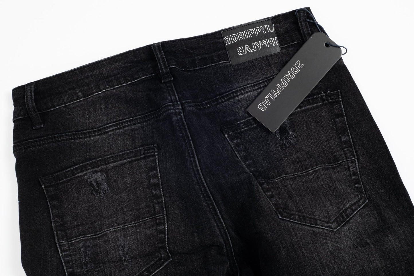 Jeans Neri Strappati™ | Stile Slim Fit con Dettagli Lucidi