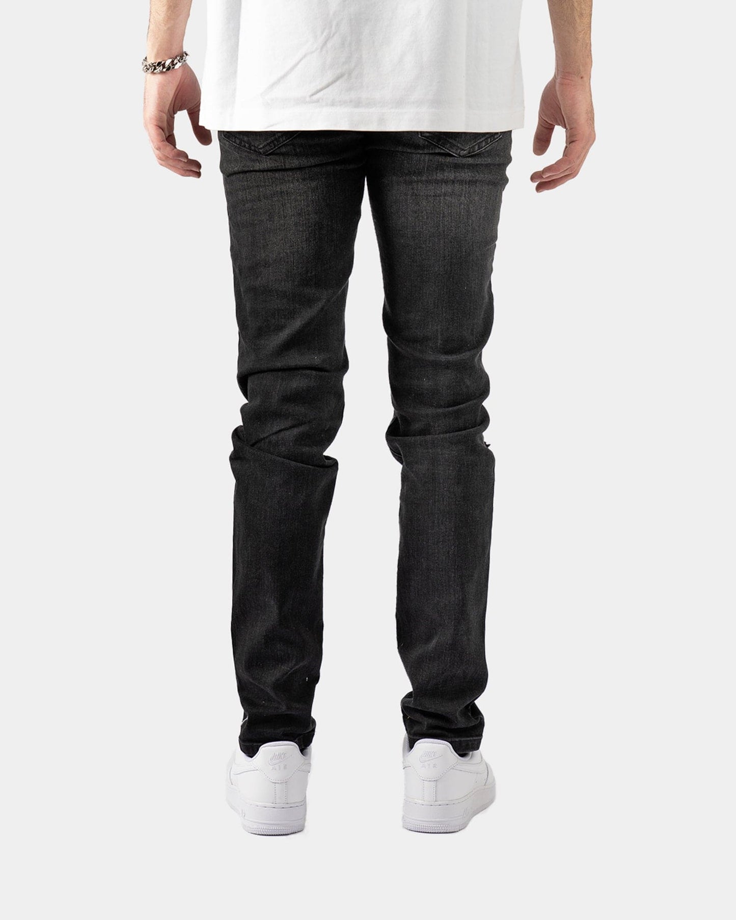 Jeans Neri Strappati™ | Stile Slim Fit con Dettagli Lucidi