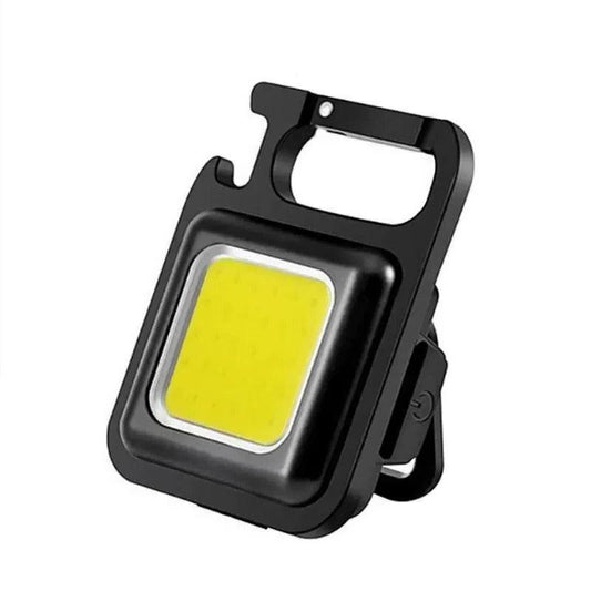 Mini Torcia LED Portachiavi Multifunzione – Ricaricabile USB per Campeggio e Outdoor
